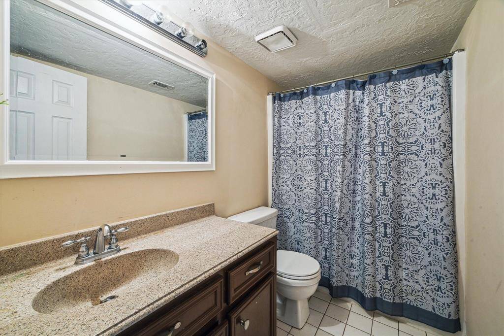SECOND FULL BATH WITH A TUB/SHOWER.