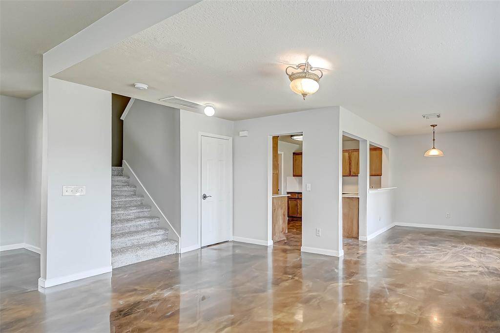The family room, kitchen, and breakfast area seamlessly flow into each other.