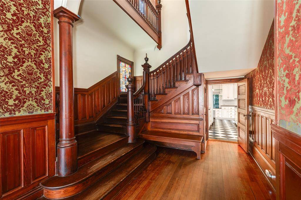 The staircase leading up is original and gorgeous.