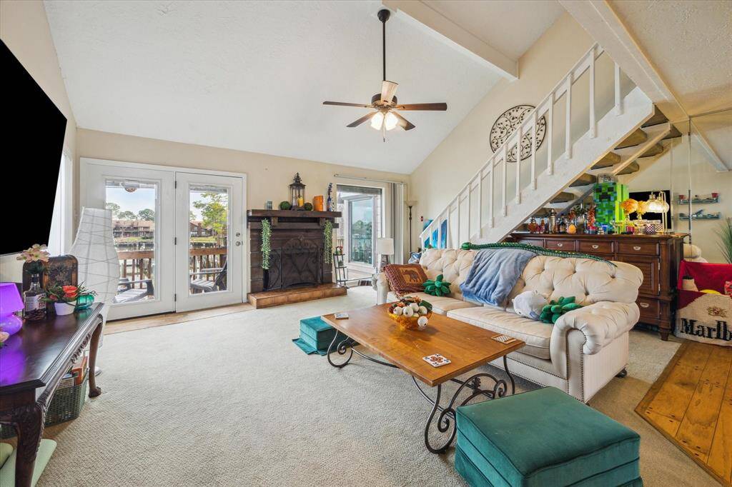 THE 2ND LEVEL FEATURES AN OPEN DESIGN WITH A LIVING, DINING AND KITCHEN AREA.