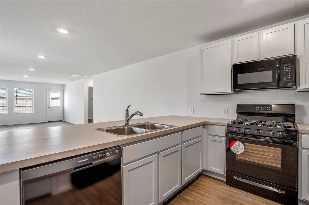 Kitchen features Frigidaire appliances.