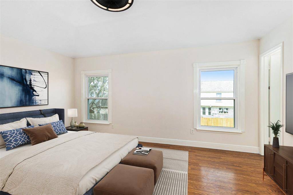 Upstairs Primary is spacious and has a private en suite. (Virtually Staged)