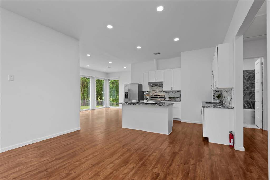Open concept kitchen and family room.
