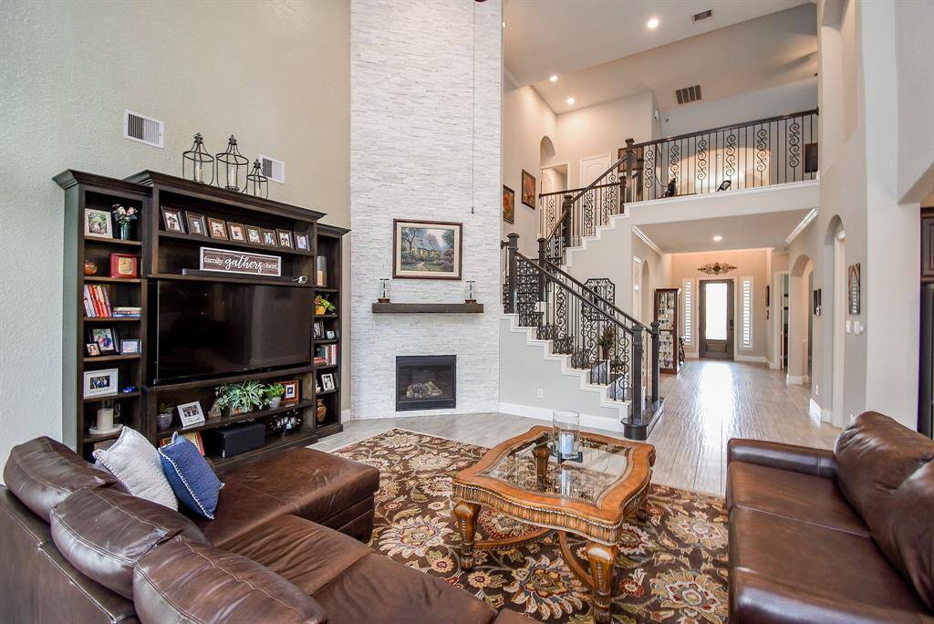 Stacked stone fireplace to the ceiling adds a nice touch!