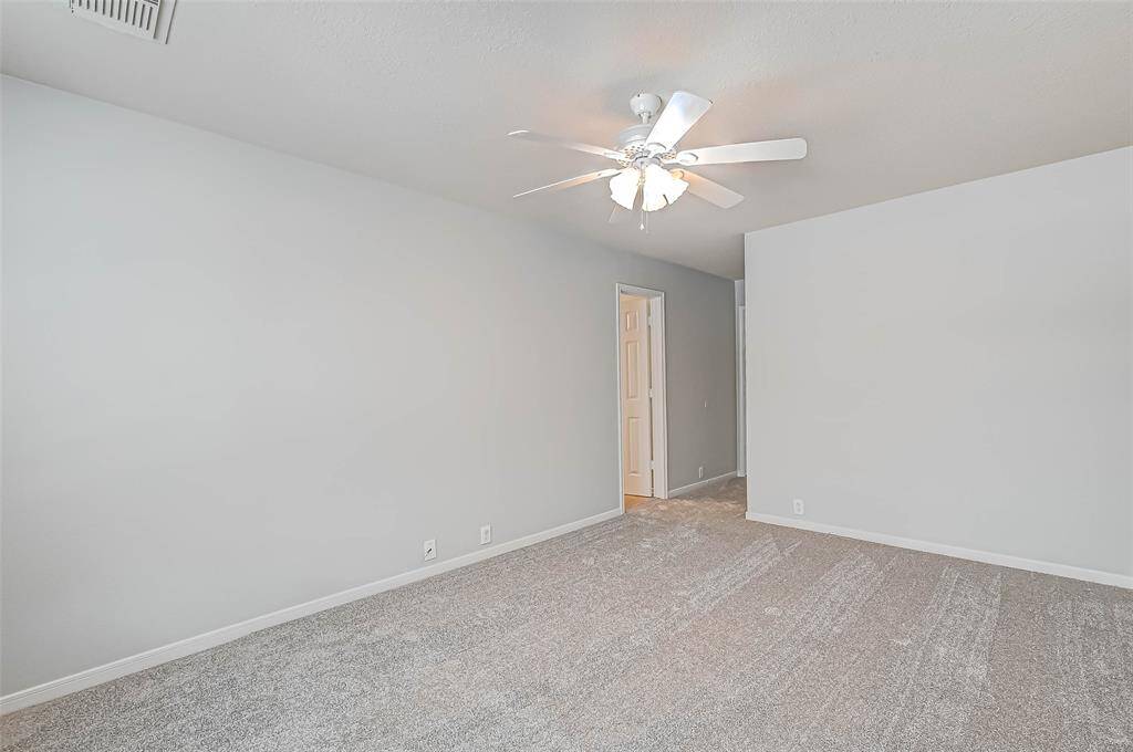 The door to the left opens into the primary bathroom.