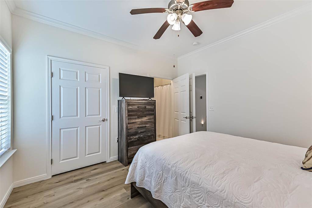 Luxurious primary bedroom with ensuite bathroom.