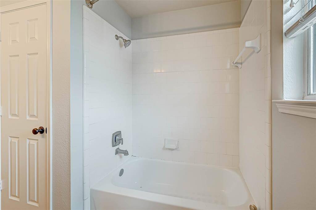 The generously-sized primary closet offers plenty of hanging space.