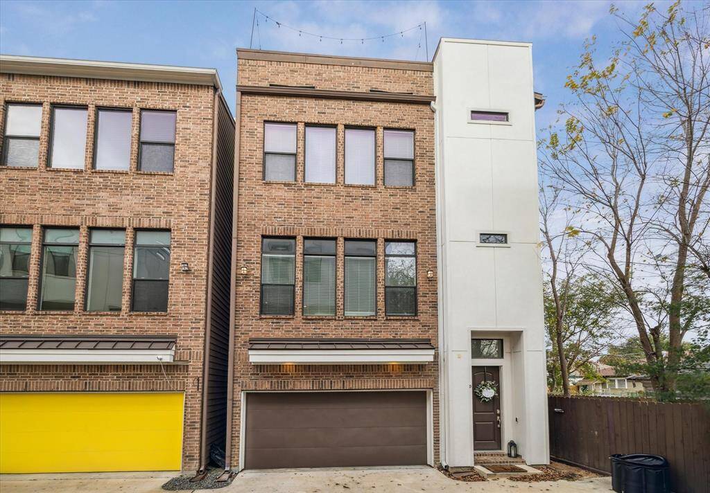 Tucked in the back of the gated community of Burr Townsites featuring 7 homes is your 4 story home, 209 Burr St #D!