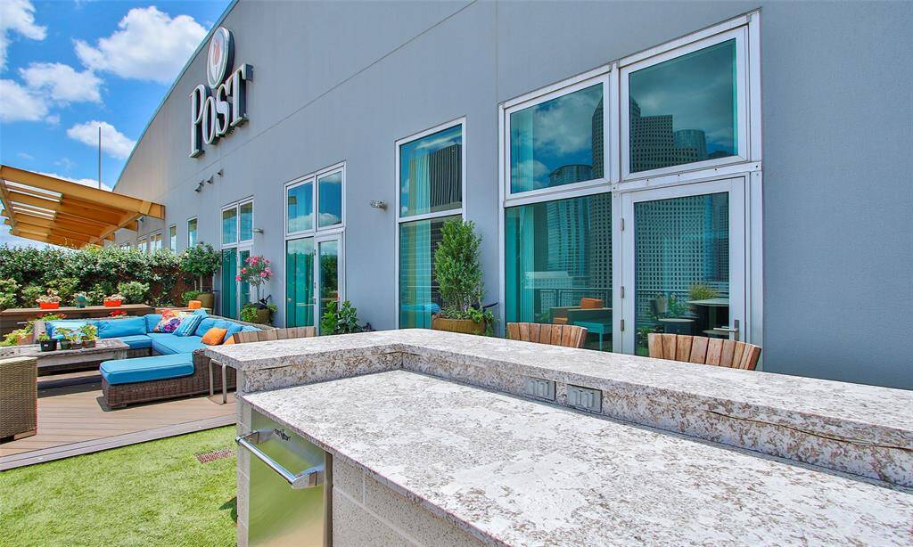 First door opens to the secondary bedroom. 3 doors to access this extra large terrace! Outdoor granite bar with build in kitchen and beverage chiller.