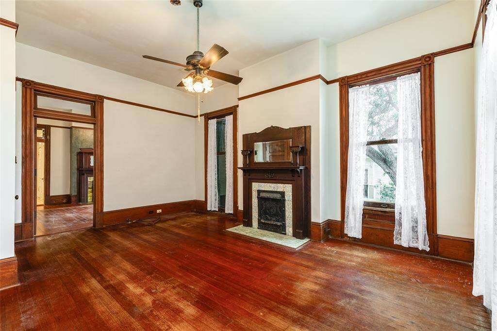 This bedroom is adjacent to the Primary on the Southeast corner of the East Wing. It features it's own closet and stunning fireplace mantel.
