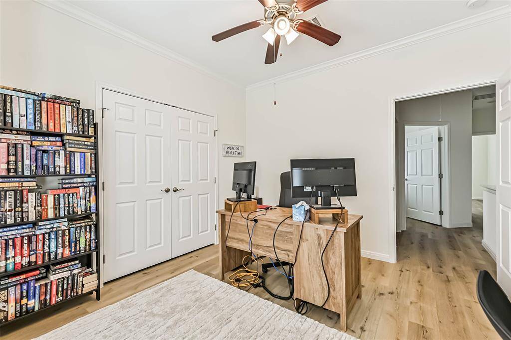 Explore the spacious double-door closet offering generous storage options.