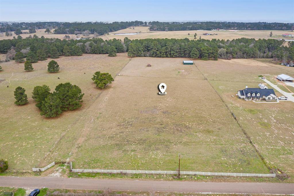 The pin is approximately on the highest point of the property