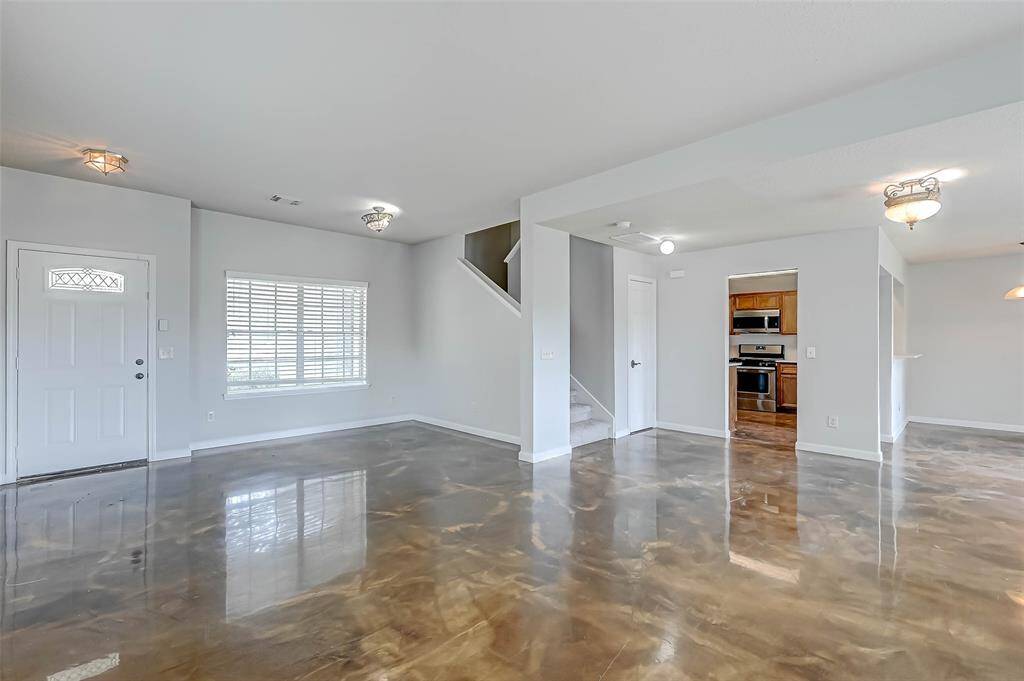 Wow! The first floor is open and spacious, with plenty of room for a home office, family room furniture, and dining table.
