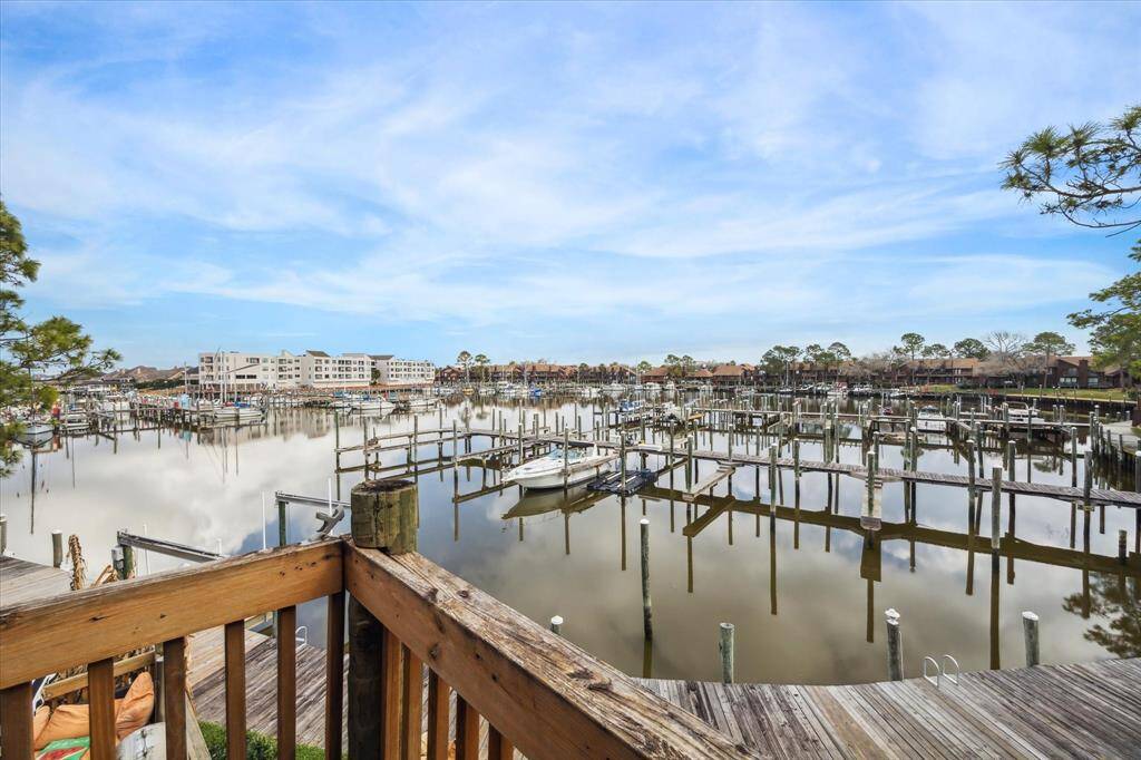 OUTSTANDING MARINA VIEWS FROM BALCONIES ON THE FIRST AND SECOND LEVELS! DOCK YOUR BOAT AT A SLIP WITHIN WALKING DISTANCE.