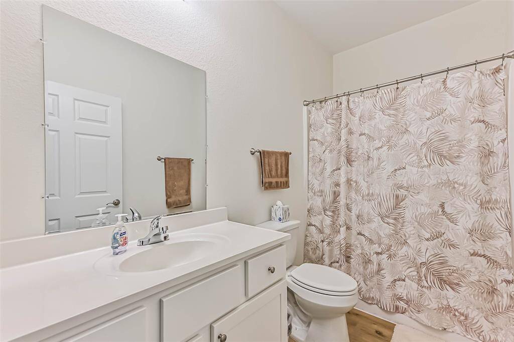 Inviting guest bathroom with elegant fixtures, perfect for comfort and convenience.