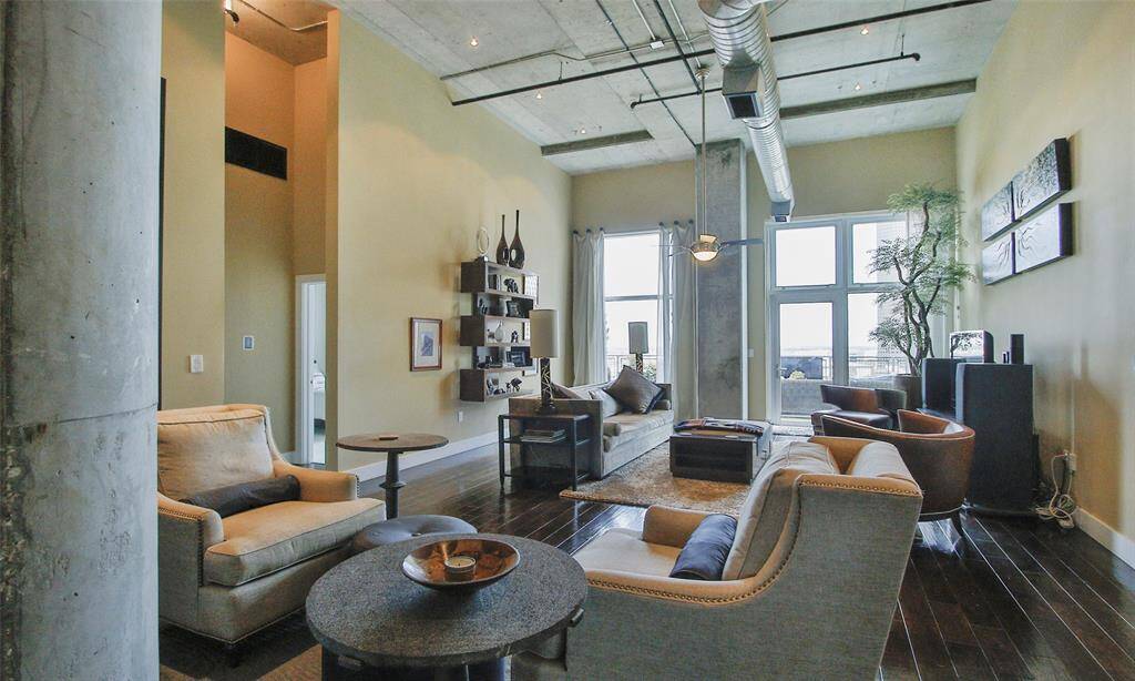 View of the living and sitting area from entry way. This wonderful space exudes comfort and style!