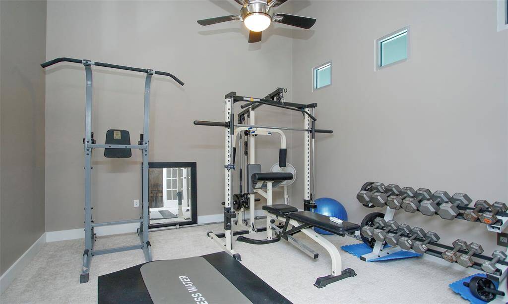 This bedroom is currently being used as a home gym.  Great flex room option to create a room as you need.