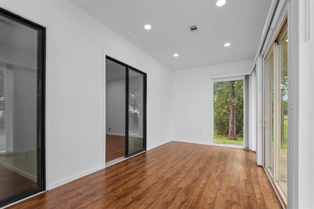 Sunroom overlooking the large yard