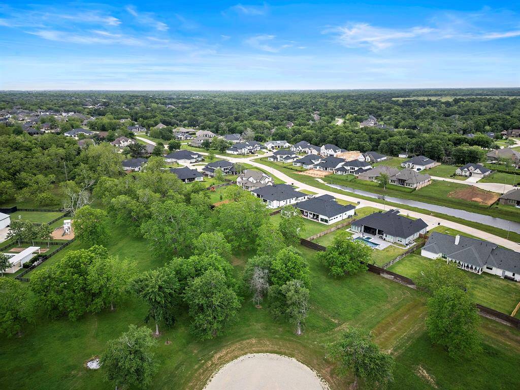 A 2-acre lot in a gated community, where custom builders are welcome to bring your dream home to life.