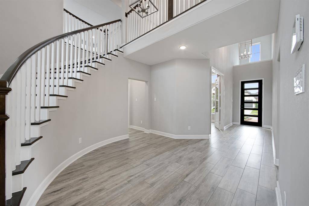 30730 Sonora Ridge Drive, Jordan RanchThe beautiful "wood" design ceramic tile floors are in the entry, extended entry, family room, kitchen, eating area, utility, Bath 2, patio and study. ($13,876.00)