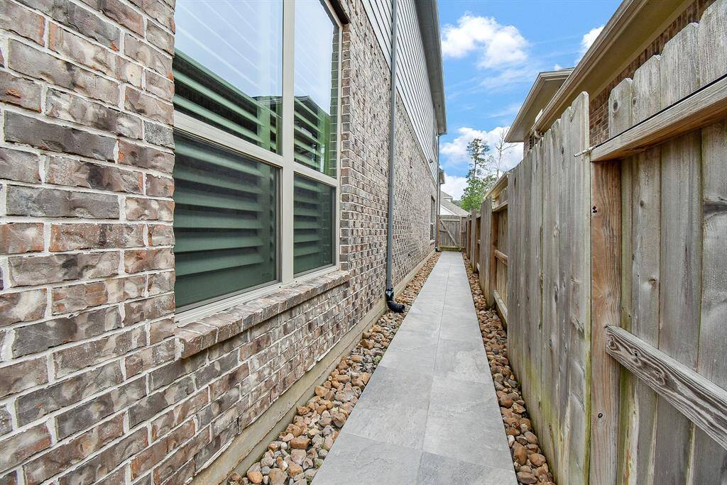 Sidewalk down the side of the house