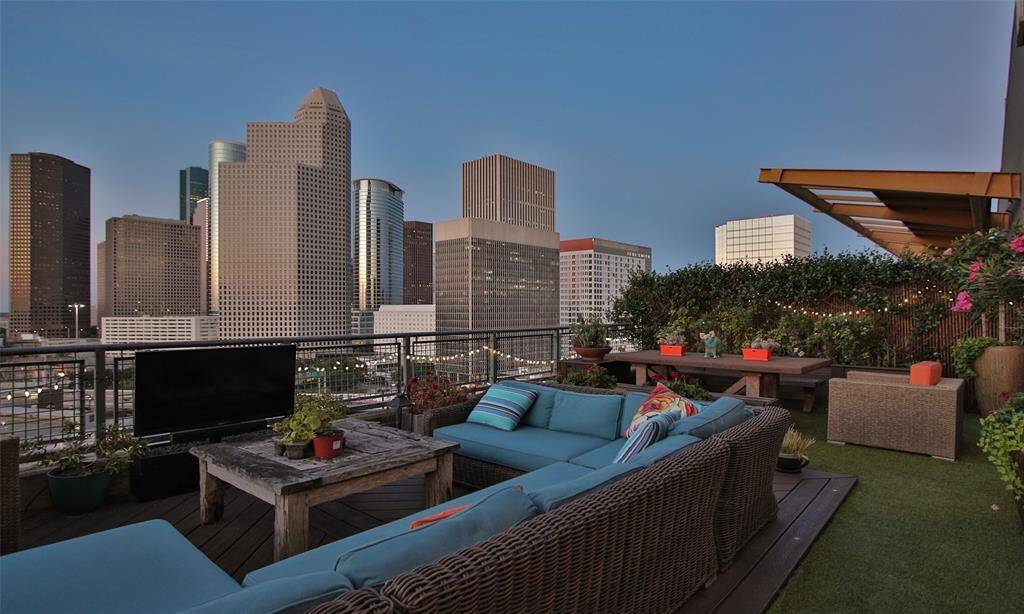 Stunning penthouse unit with an oversized terrace is located in the desirable Midtown Rise lofts - this treasure won't last long!