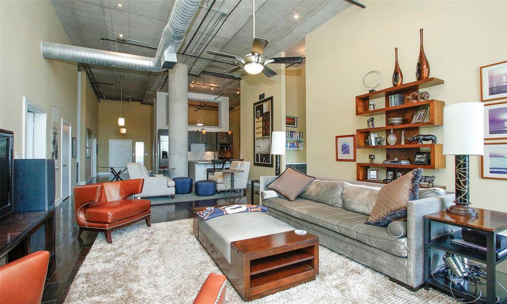 Experience luxury loft living at its finest! Soaring 15' ceilings and exposed ceilings with ALL the modern high end finishes you can imagine. This original Rise owner did not spare any cost when remodeling this one-of-a kind penthouse.