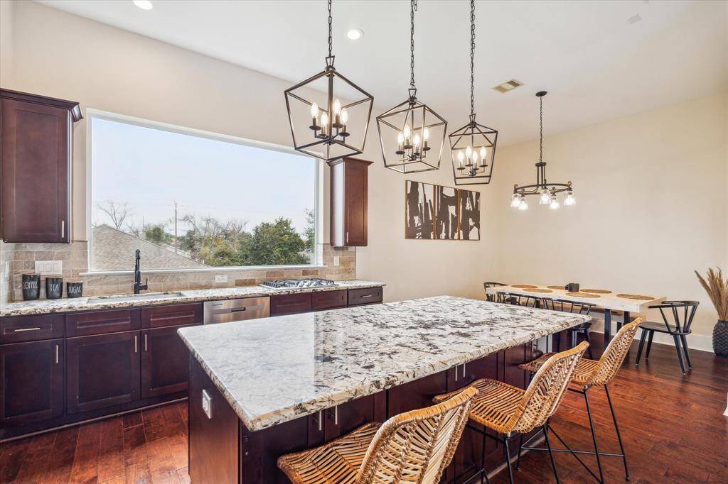 Alternate angle of the Kitchen looking towards the Dining Area.