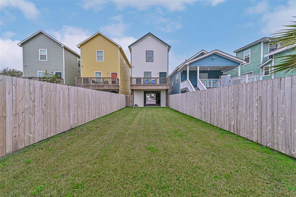 Inviting dual garage doors enhance the charm and functionality of this home.
