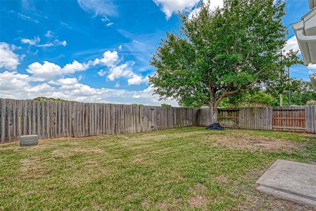 Located on a cul-de-sac, this private yard offers plenty of room for playing and entertaining.