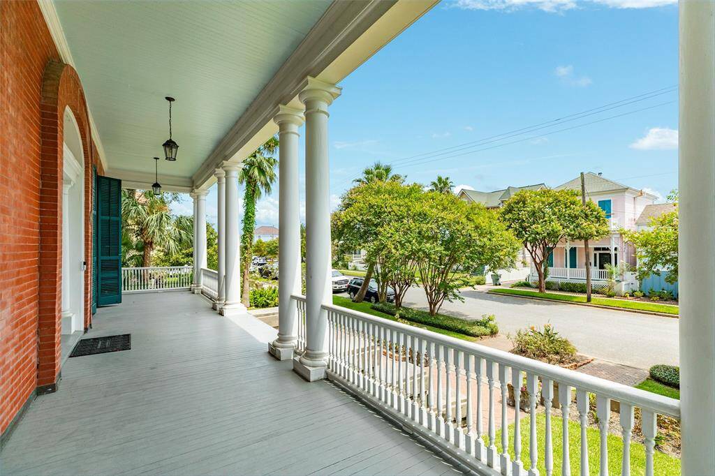 The porches are large and graceful, sitting high above the street level and serve as a strong reminder that this mansion withstood the Great Strom of 1900.