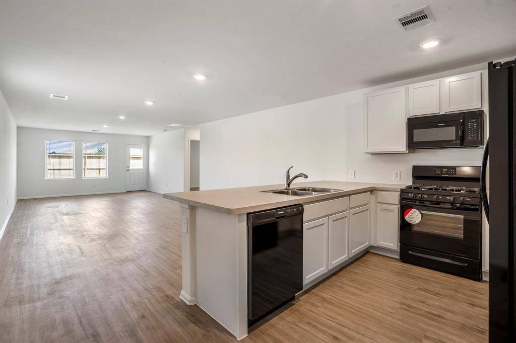 Open concept kitchen and living area.