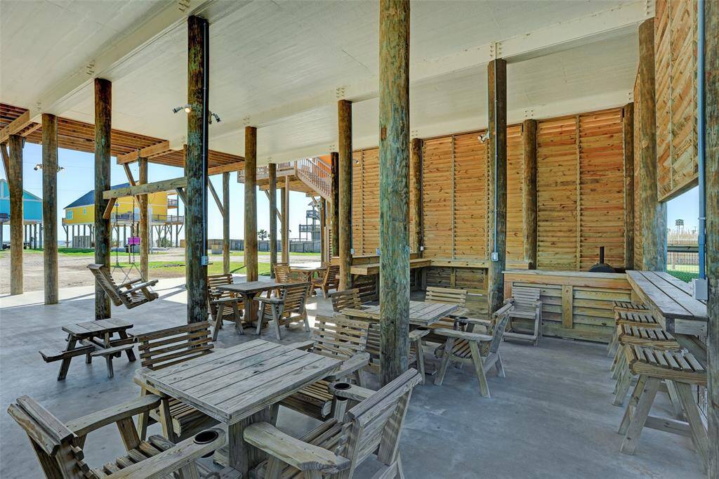 Swinging chairs and lots of outdoor furniture complete the outdoor experience