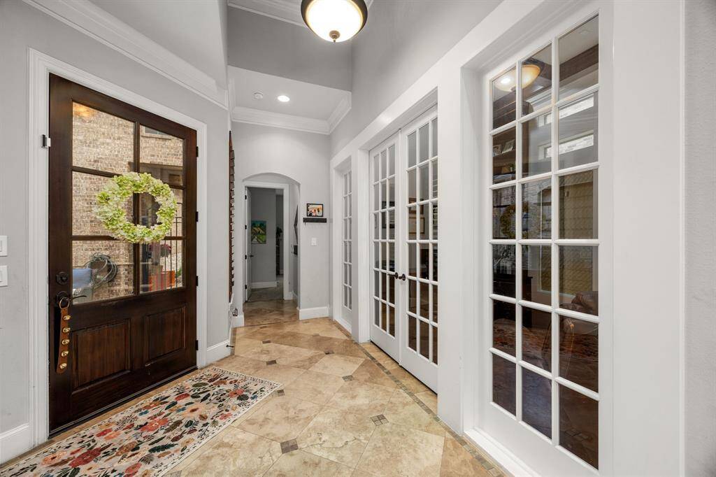 French doors lead to study, creating an inviting and open feel.