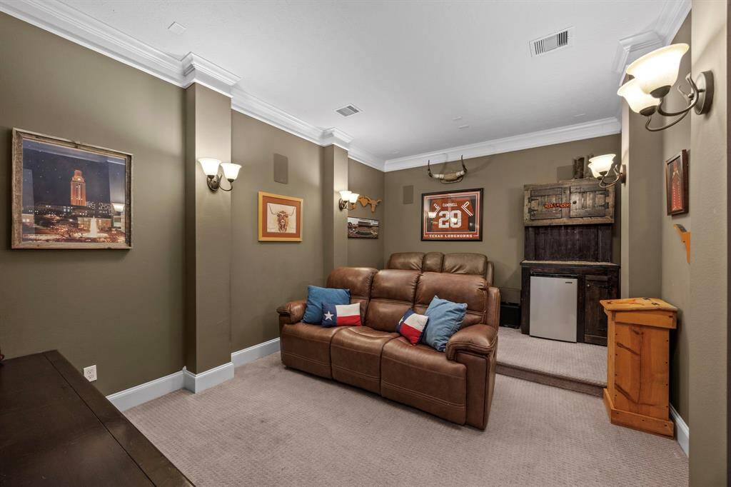 Media room is located on the first floor. Great for movie night or game day!
