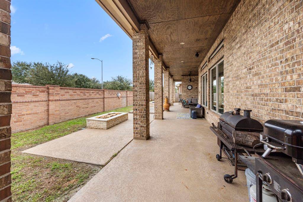 Covered patio extends the length of the home