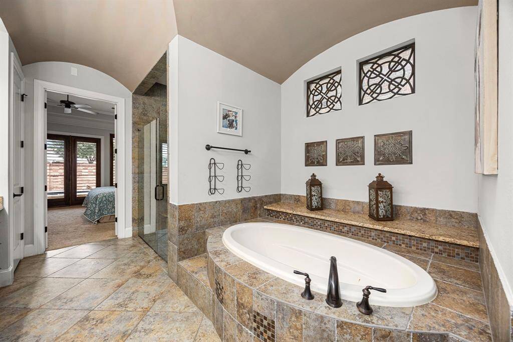 Luxurious garden tub in the primary bathroom for ultimate relaxation.