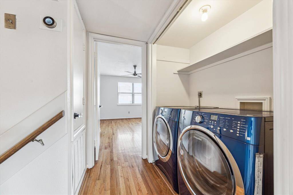 Second floor utility room with storage shelf and room for oversized units