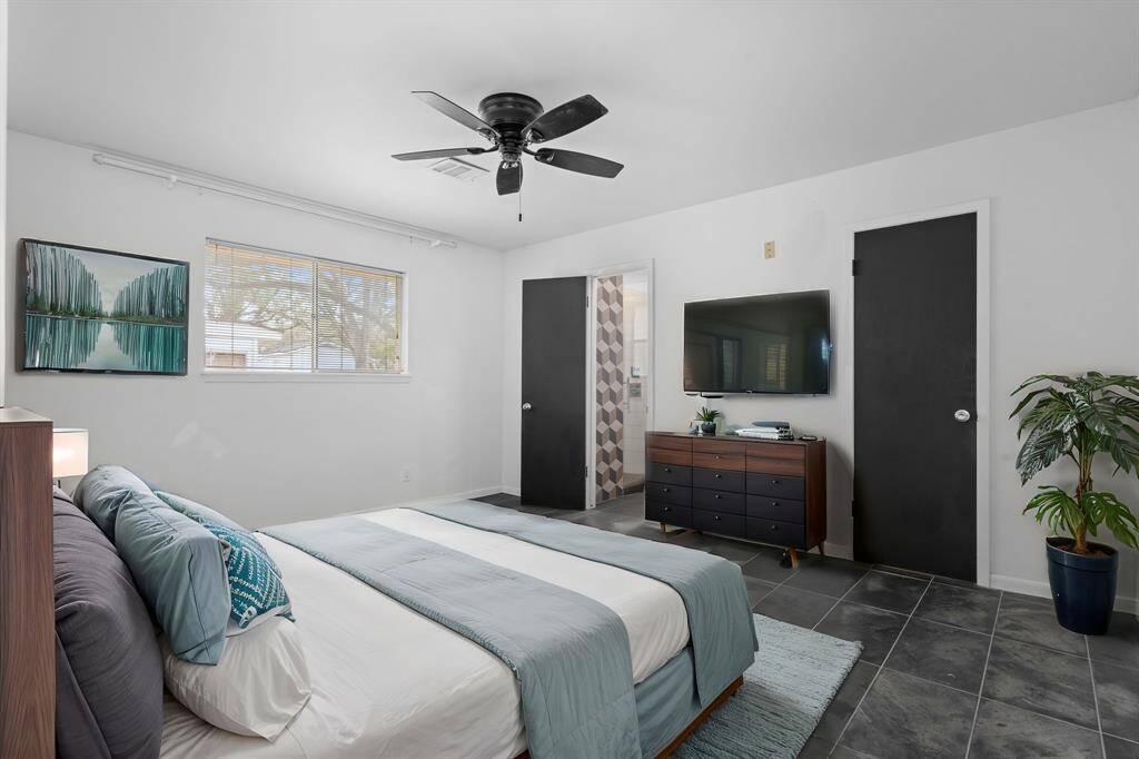 primary bedroom with walk in closet