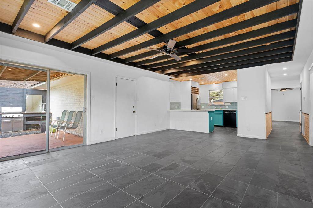 tongue and groove ceiling in main living area has been raised