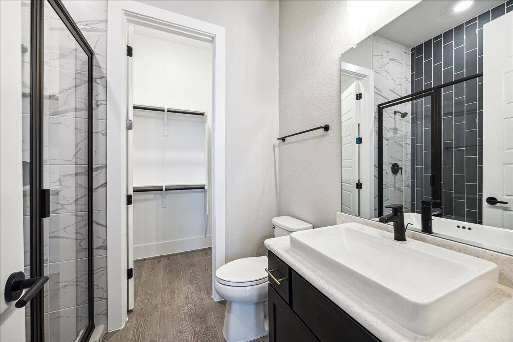 Primary Suite was extended to make it even larger! Back door for access to the pool/spa.  Raised 11' Tray Ceiling with double crown molding and recessed lighting.