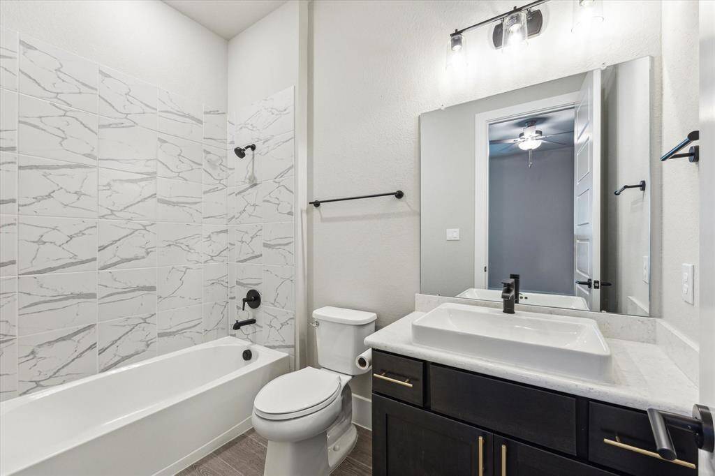 Secondary Bedroom #1 overlooking the front of the home offers ensuite Bathroom.