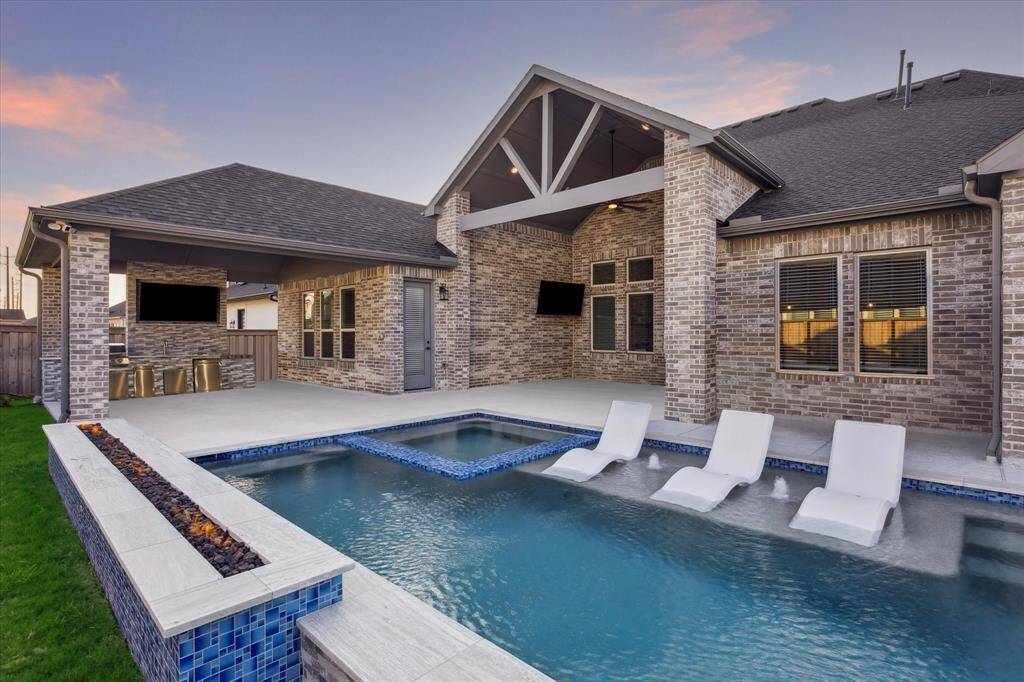Cathedral Ceiling is complimented by this view of the pool and spa.