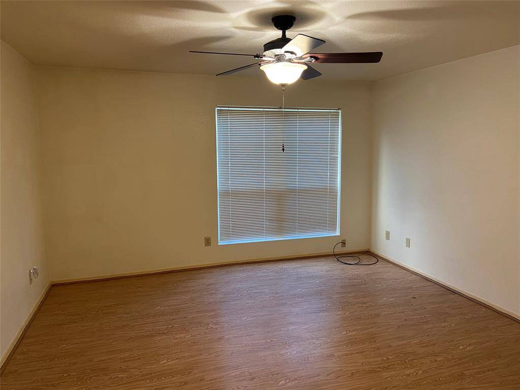 Large Primary bedroom with ceiling fan
