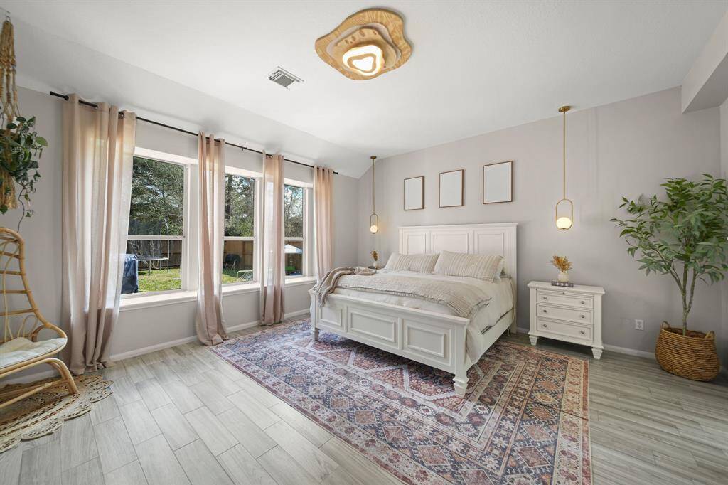 Primary bedroom with custom lighting