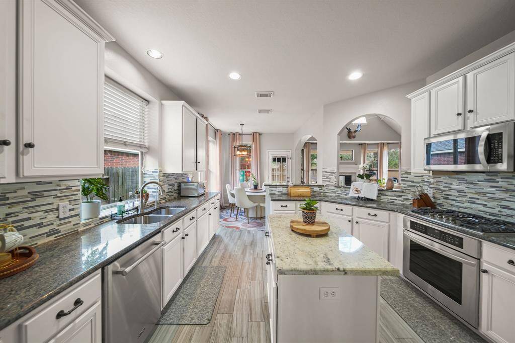 Granite countertops and stainless steel appliances