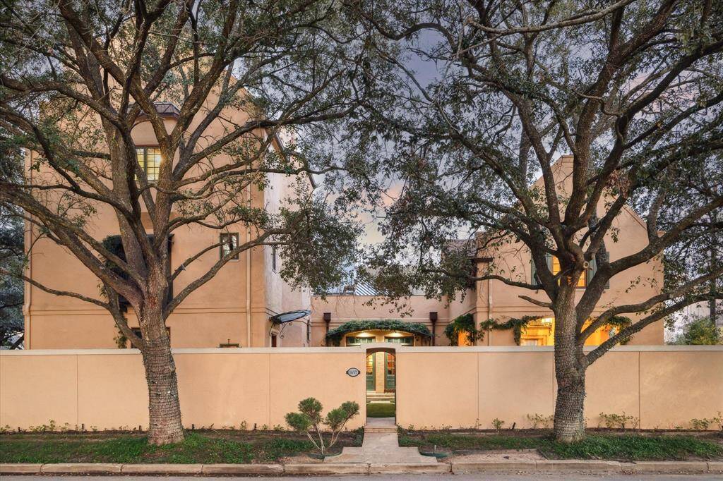Courtyard entry from Dunlavy highlights the carefully designed outdoor areas.
