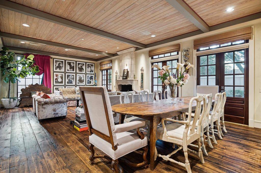 Another view of the living/dining room with the French doors that allow lots of natural light.