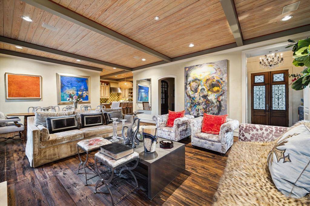 View from opposite end of living room.  Note the antique doors and chandalier in the Entry.