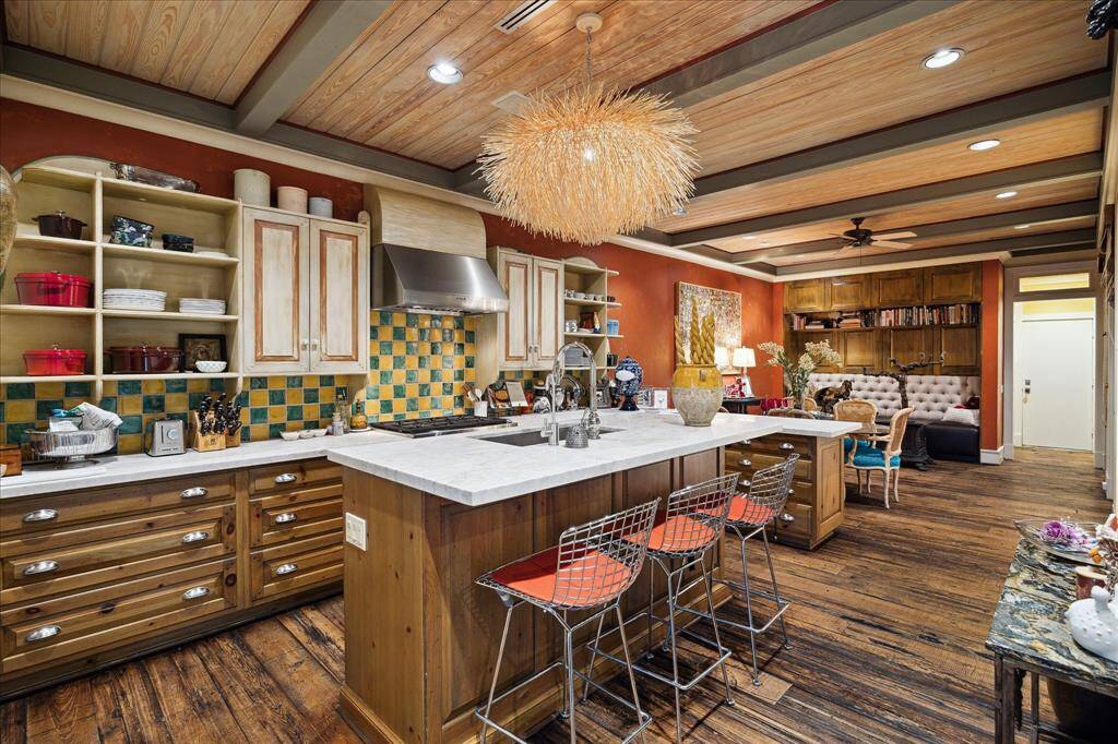 The Heart of the Home!  Stone countertops, deep sink and storage space galore.